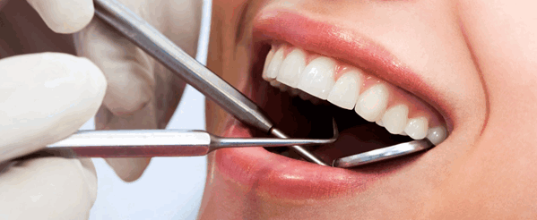 Чем опасна киста в десне над зубом 