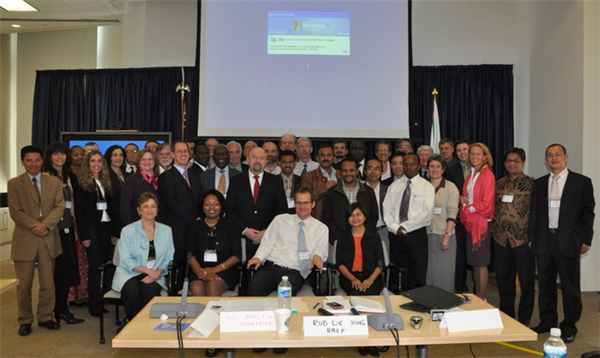 Members of the partnership for cleaner vehicles at a conference.
