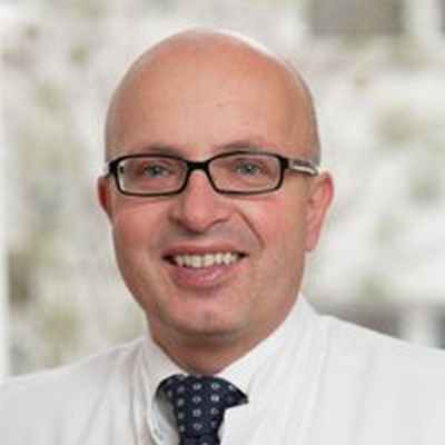 Проф., д-р мед. наук Вайганг, МВА - Портрет