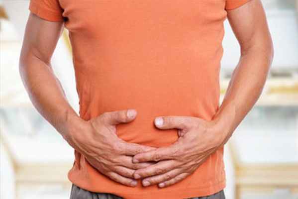 болит живот фото