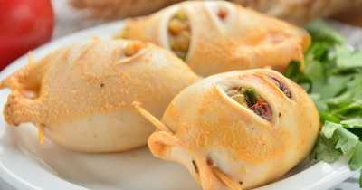 Кальмары фаршированные овощами